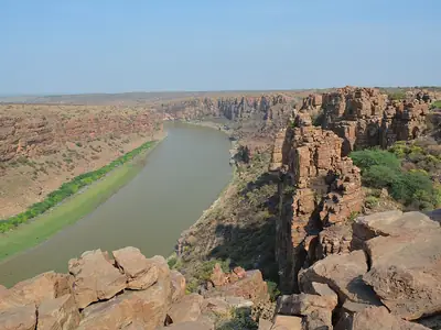 The Pennar river winding through a deep gorge of red rock
